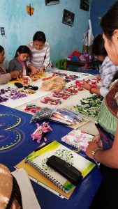 Annual distribution of toothbrushes, and this year, embroidery floss